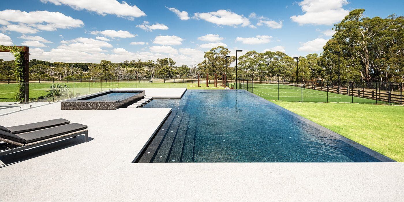 Complete landscape construction with swimming pool, lawn and paving in Narre Warren North
